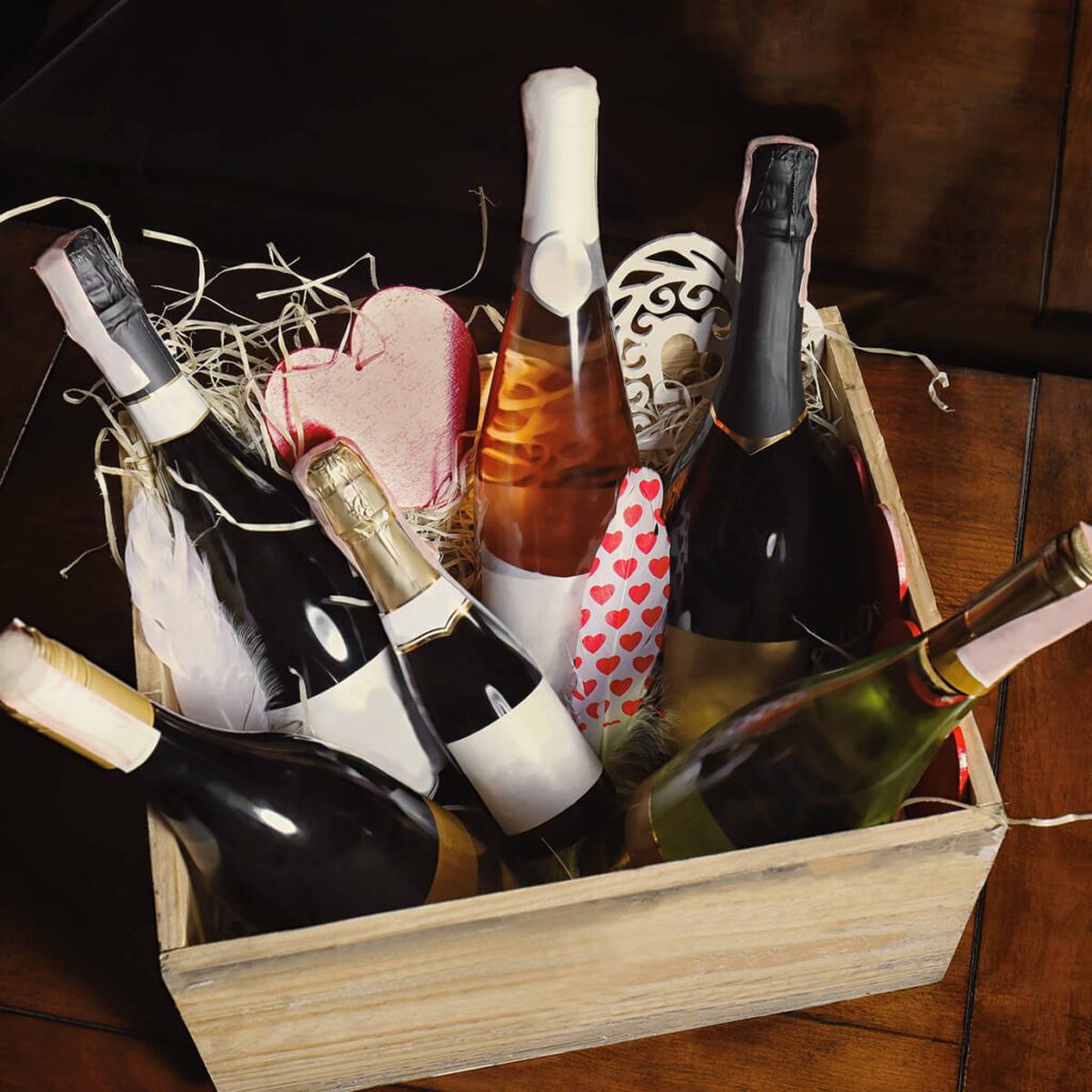 Basket of white label wine representing Liquid Kosher's custom wine club offerings